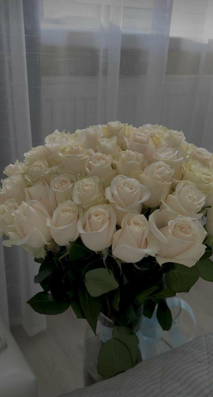 Corporate meeting room with carefully timed floral arrangements that maintain elegance throughout business hours